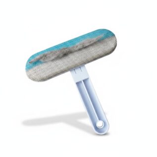 4-in-1 pet grooming brush on white background