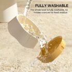 Cat feeder bowl and insert being rinsed with water