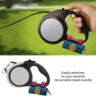 Dog waste bag pouch attached to a retractable leash handle